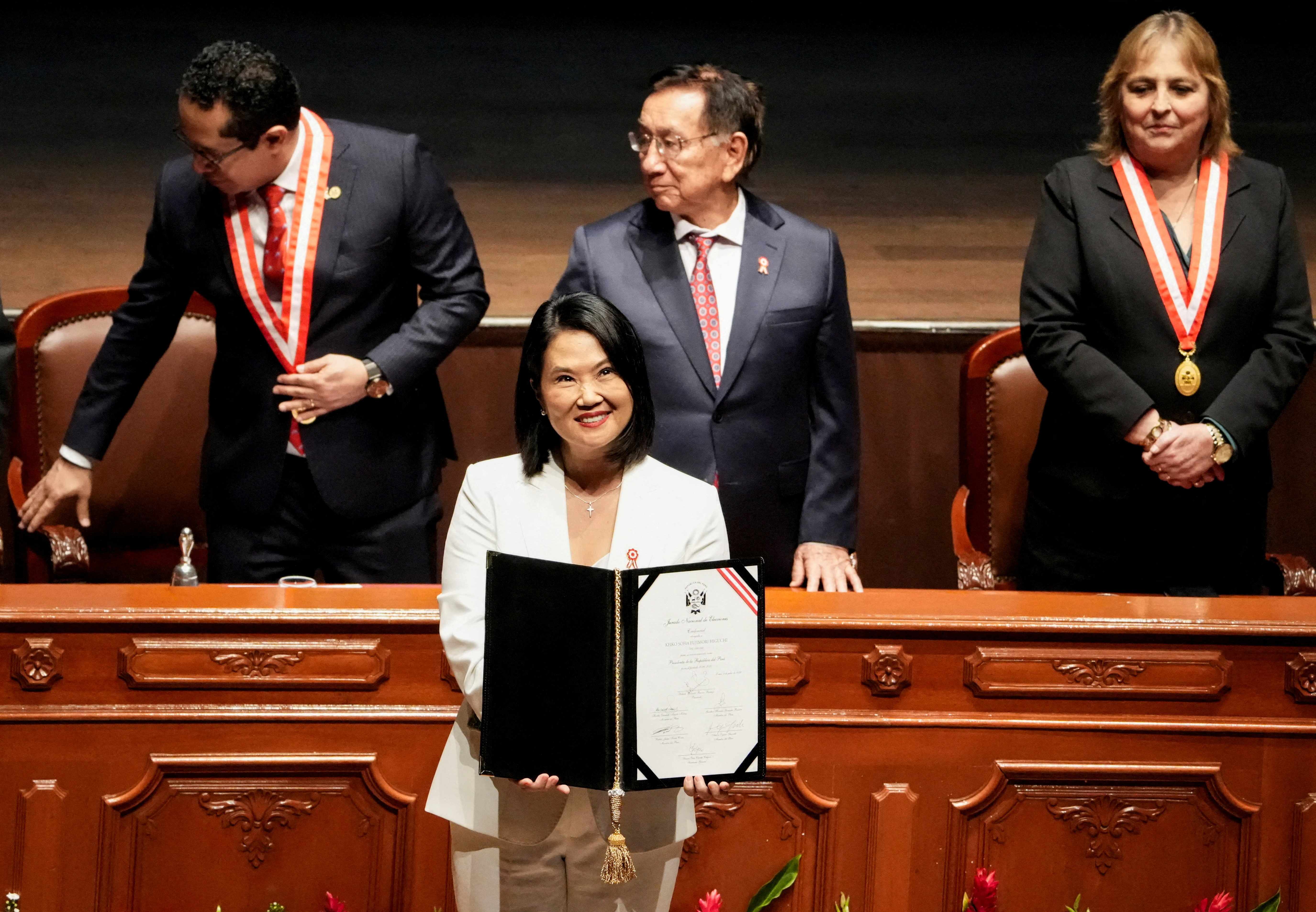 Peru's Fujimori takes power, extending Latin America's rightward tilt